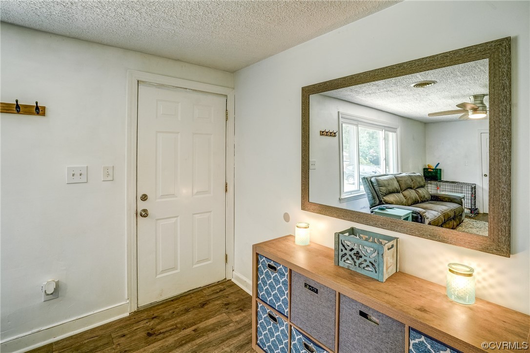 3312 Hawkins Road Henrico, VA 23228 - Photo 27 of 32 a bathroom with a granite countertop sink and a mirror