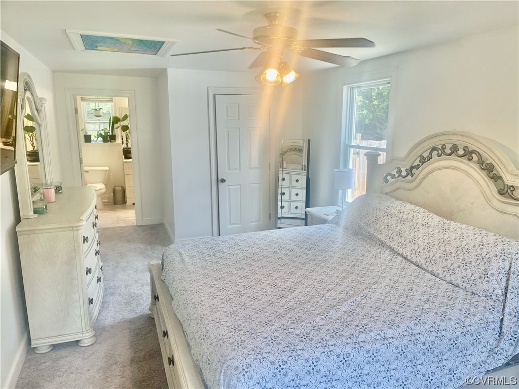 3312 Hawkins Road Henrico, VA 23228 - Photo 31 of 32 a bedroom with a bed and a sink