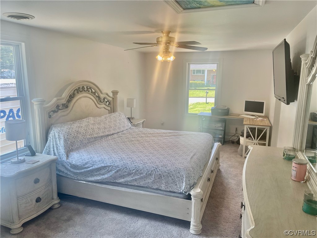 3312 Hawkins Road Henrico, VA 23228 - Photo 32 of 32 a bedroom with a bed and a flat screen tv