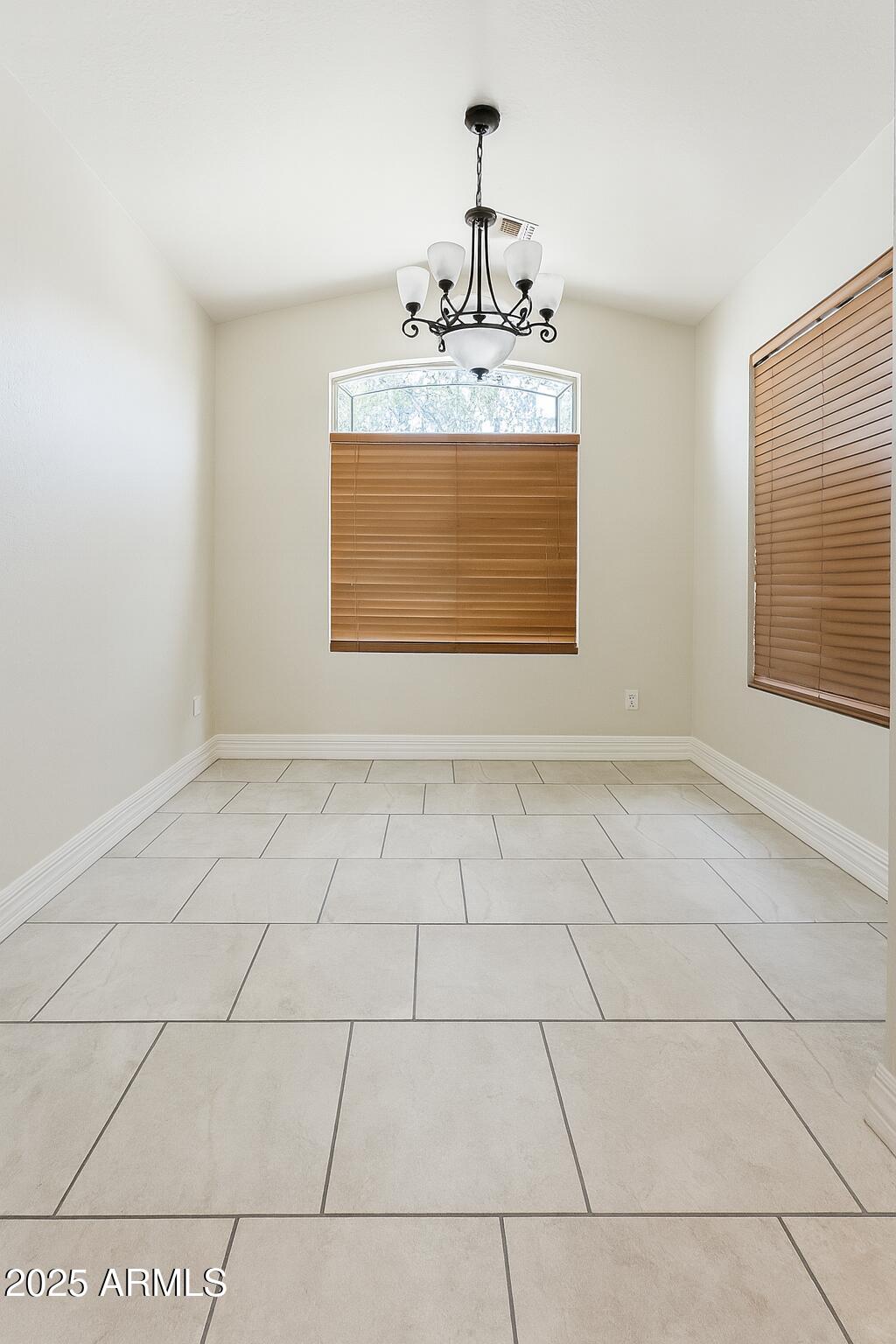 23993 West Pecan Road Buckeye, AZ 85326 - Photo 5 of 12 a view of an empty room with window