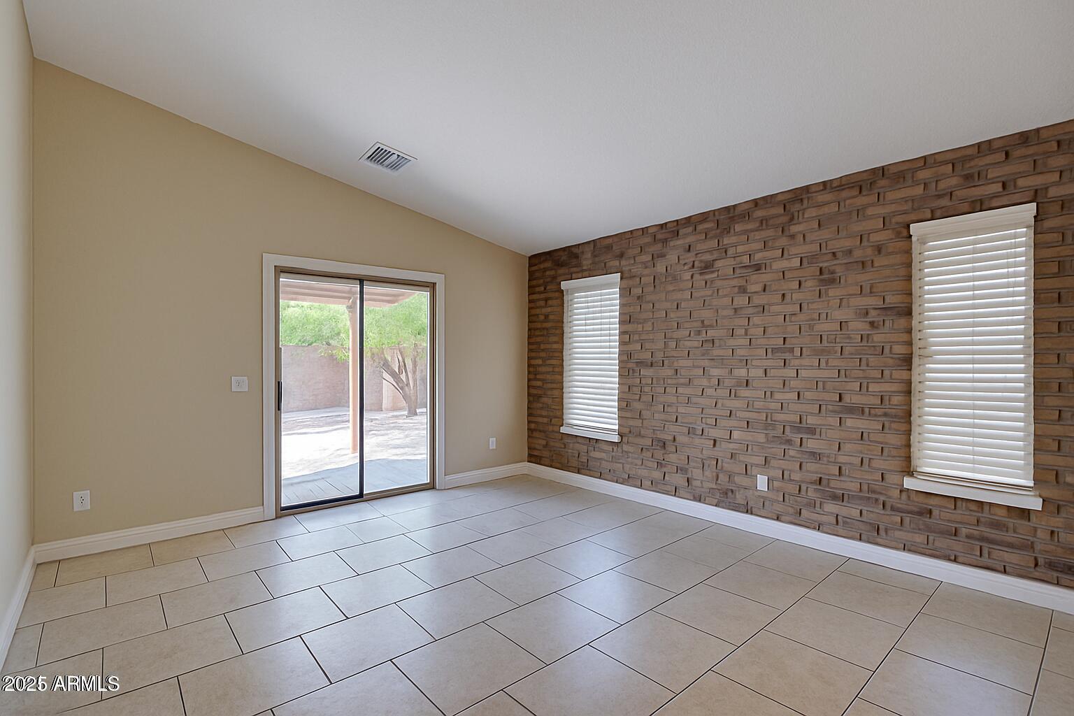 23993 West Pecan Road Buckeye, AZ 85326 - Photo 6 of 12 a view of an empty room with a window