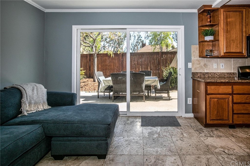 7314 East Equitation Way Orange, CA 92869 - Photo 15 of 37 a living room with furniture and a fireplace