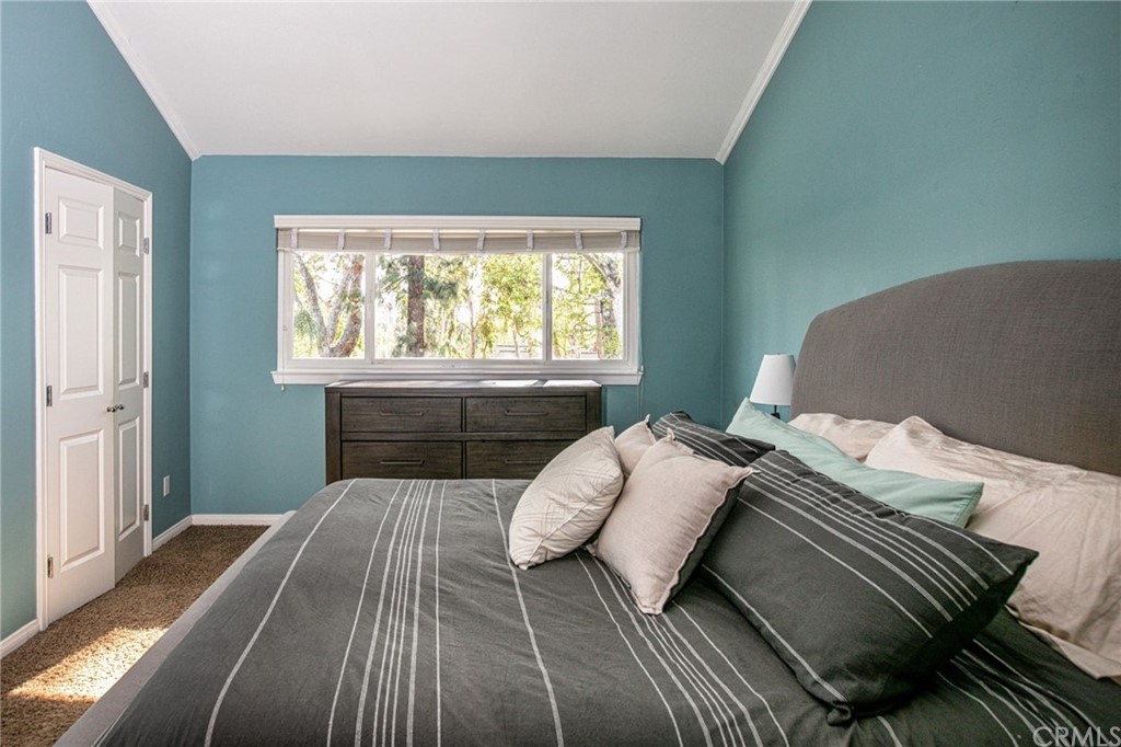 7314 East Equitation Way Orange, CA 92869 - Photo 17 of 37 a bedroom with a bed and a window
