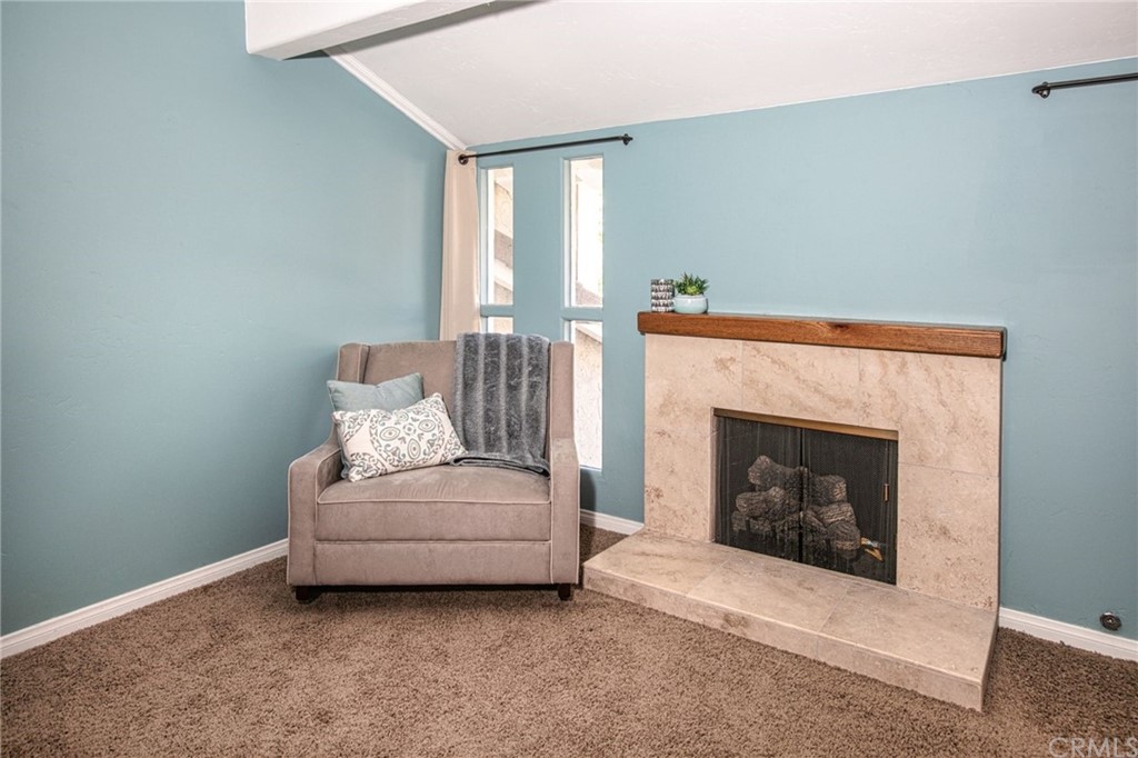 7314 East Equitation Way Orange, CA 92869 - Photo 19 of 37 a living room with furniture and a fireplace