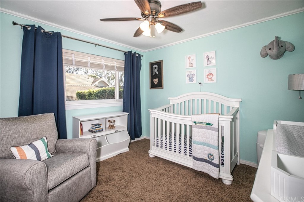 7314 East Equitation Way Orange, CA 92869 - Photo 22 of 37 a bedroom with furniture and a window