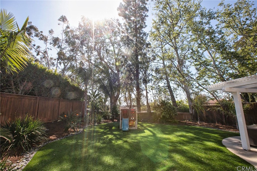 7314 East Equitation Way Orange, CA 92869 - Photo 26 of 37 a garden with trees in front of it