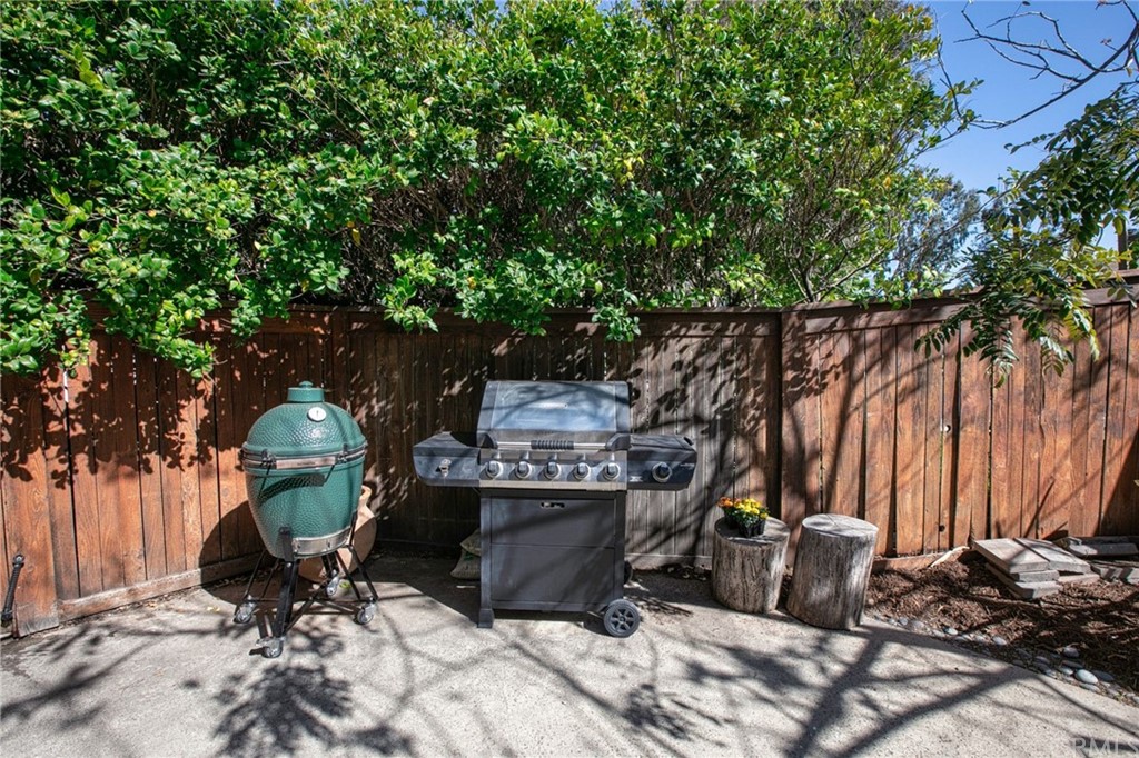 7314 East Equitation Way Orange, CA 92869 - Photo 32 of 37 a view of a chairs and table in backyard
