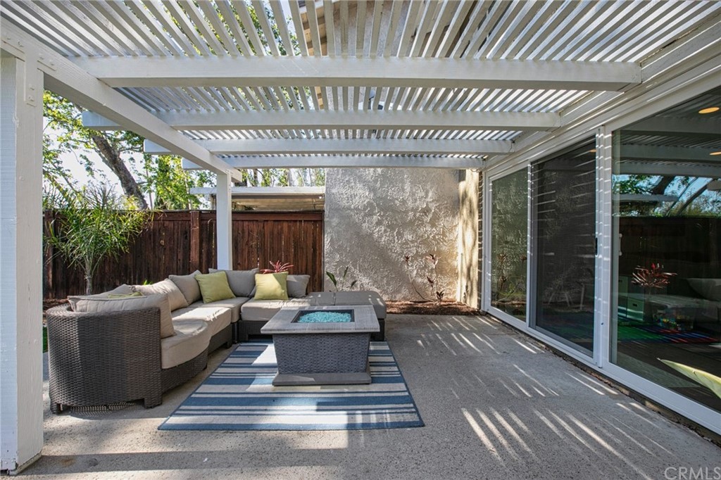 7314 East Equitation Way Orange, CA 92869 - Photo 4 of 37 a living room with furniture and a large window