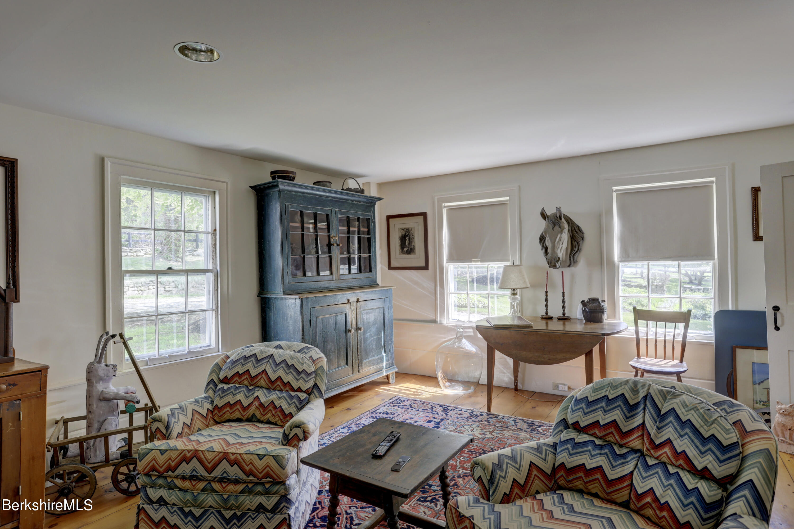 185 Keyes Hill Road New Marlborough, MA 01259 - Photo 18 of 49 a living room with furniture and a window
