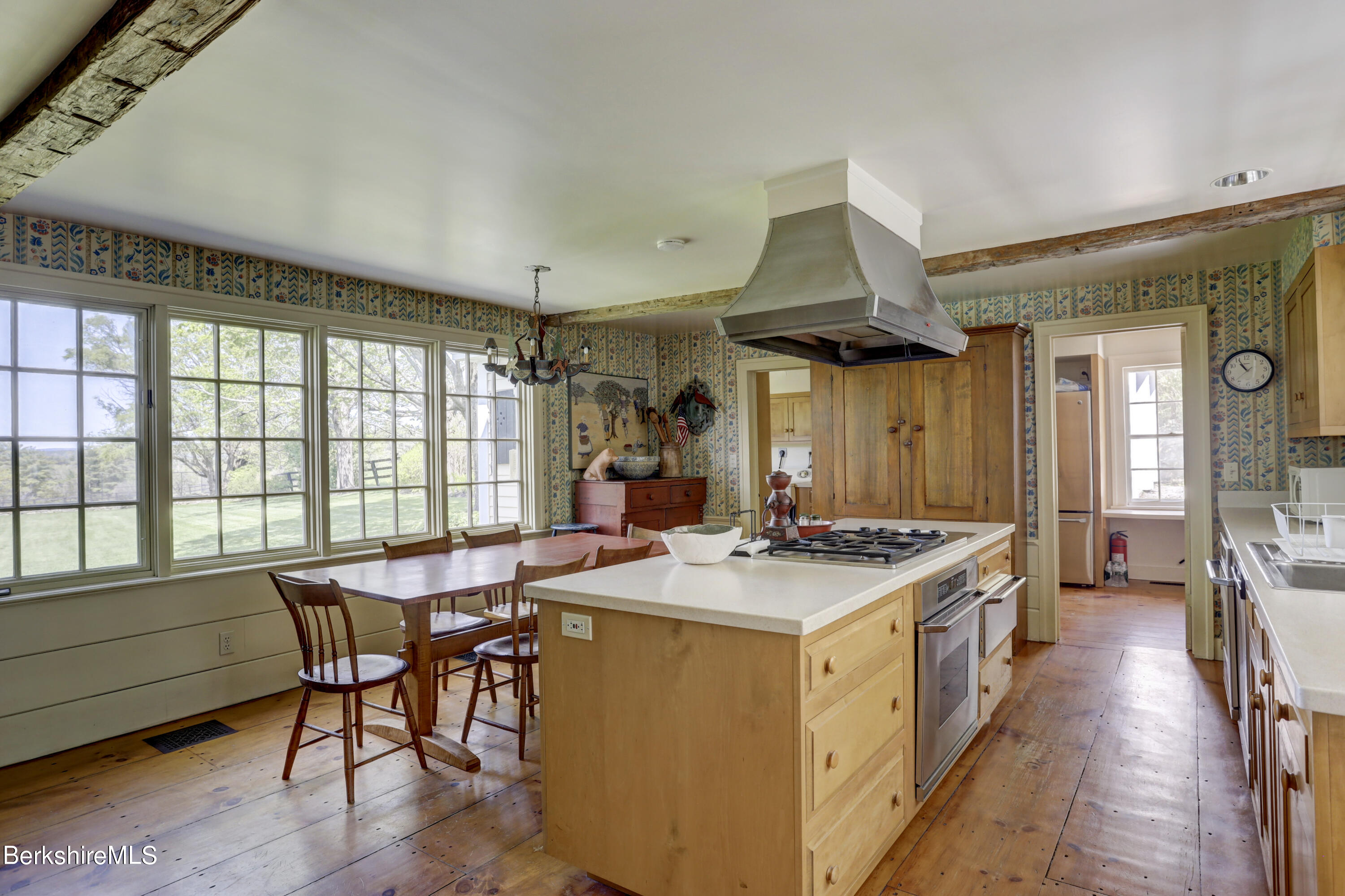 185 Keyes Hill Road New Marlborough, MA 01259 - Photo 19 of 49 a kitchen that has a stove and a table in it