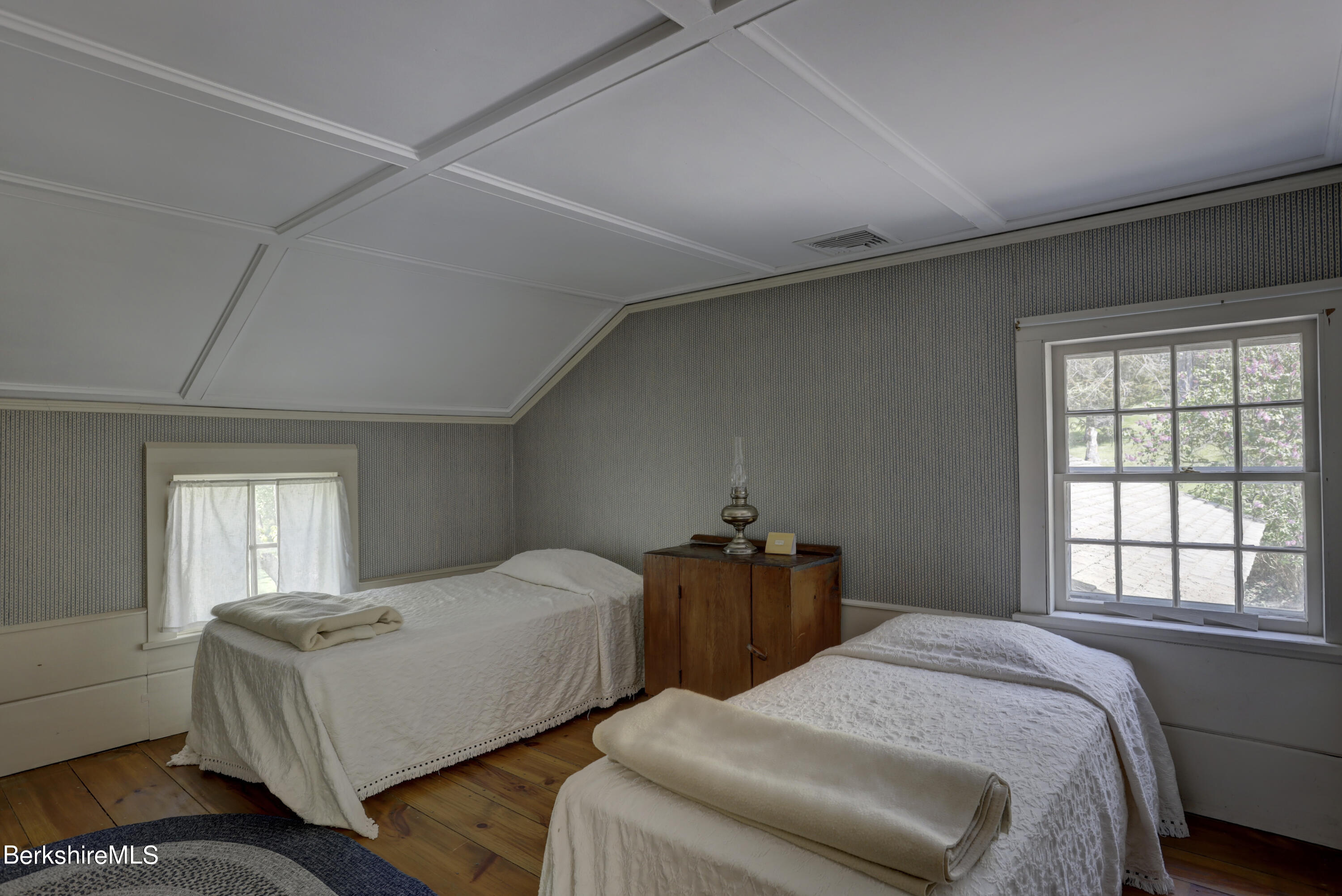 185 Keyes Hill Road New Marlborough, MA 01259 - Photo 29 of 49 a bedroom with two beds and a large window