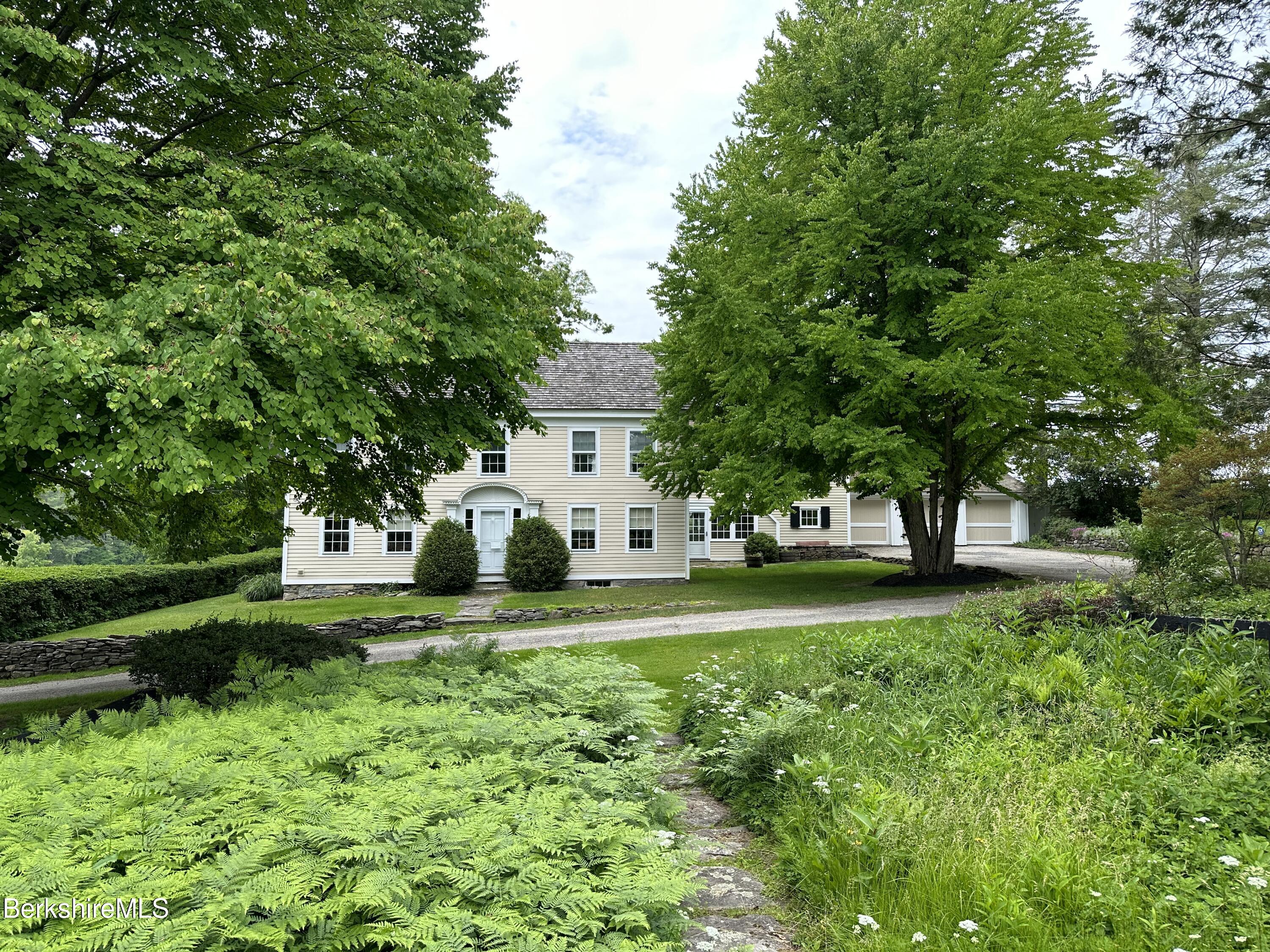 185 Keyes Hill Road New Marlborough, MA 01259 - Photo 48 of 49 a view of a house with a big yard and large trees