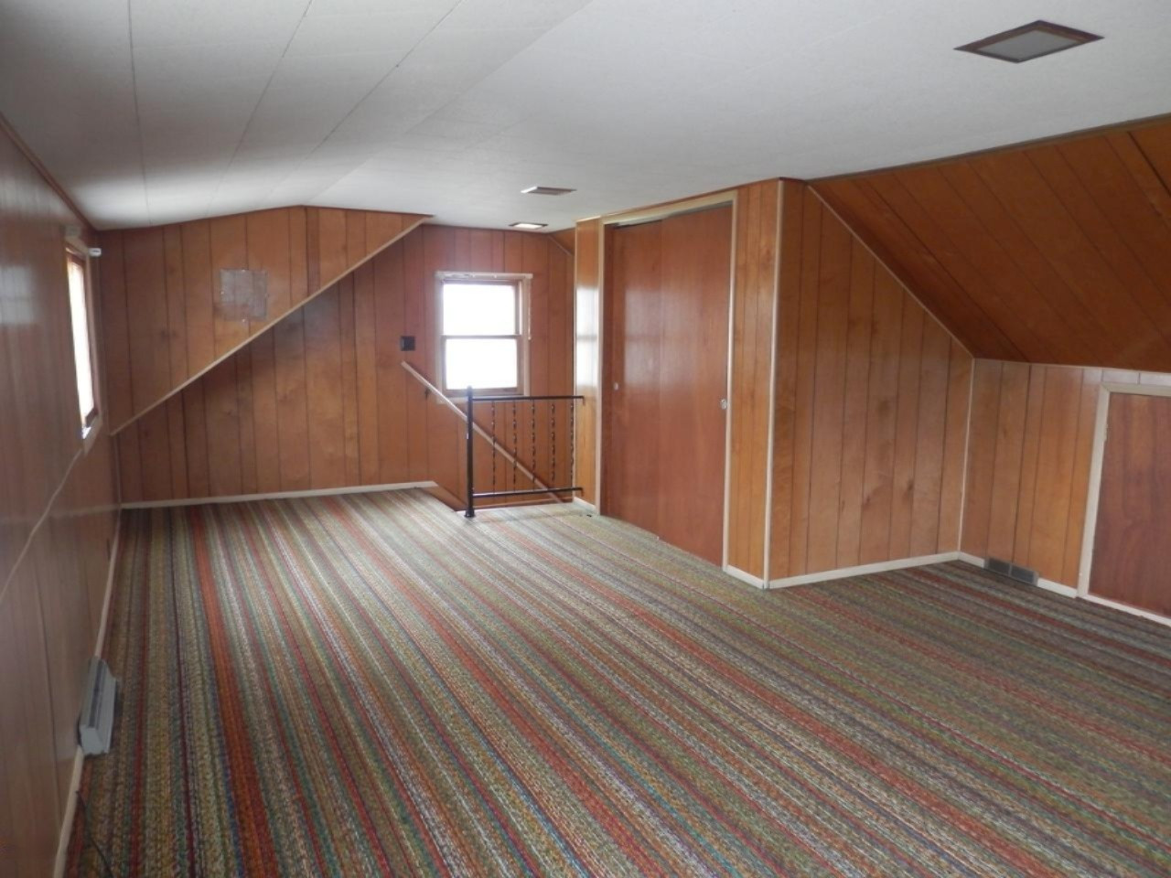 603 Ramsdell Street Manistee, MI 49660 - Photo 13 of 22 Upstairs Bedroom