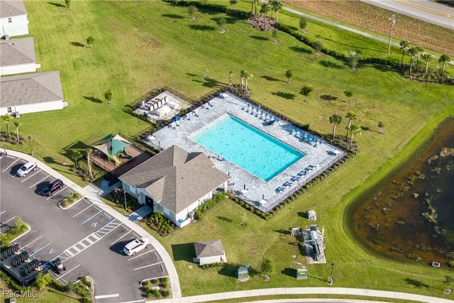an aerial view of a house with a garden