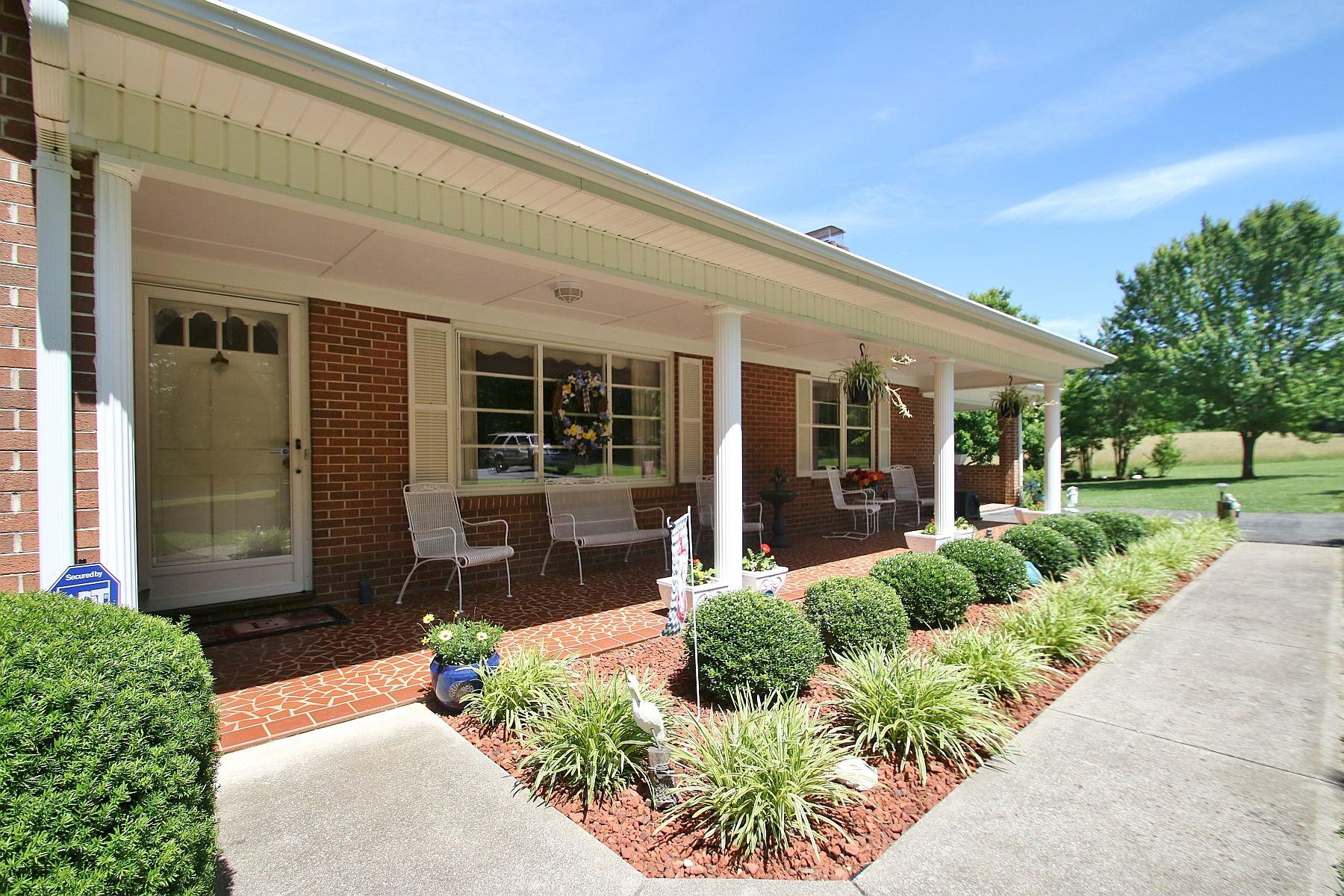 164 Standiford Road Union Hall, VA 24176 - Photo 13 of 40 a front view of a house with a yard
