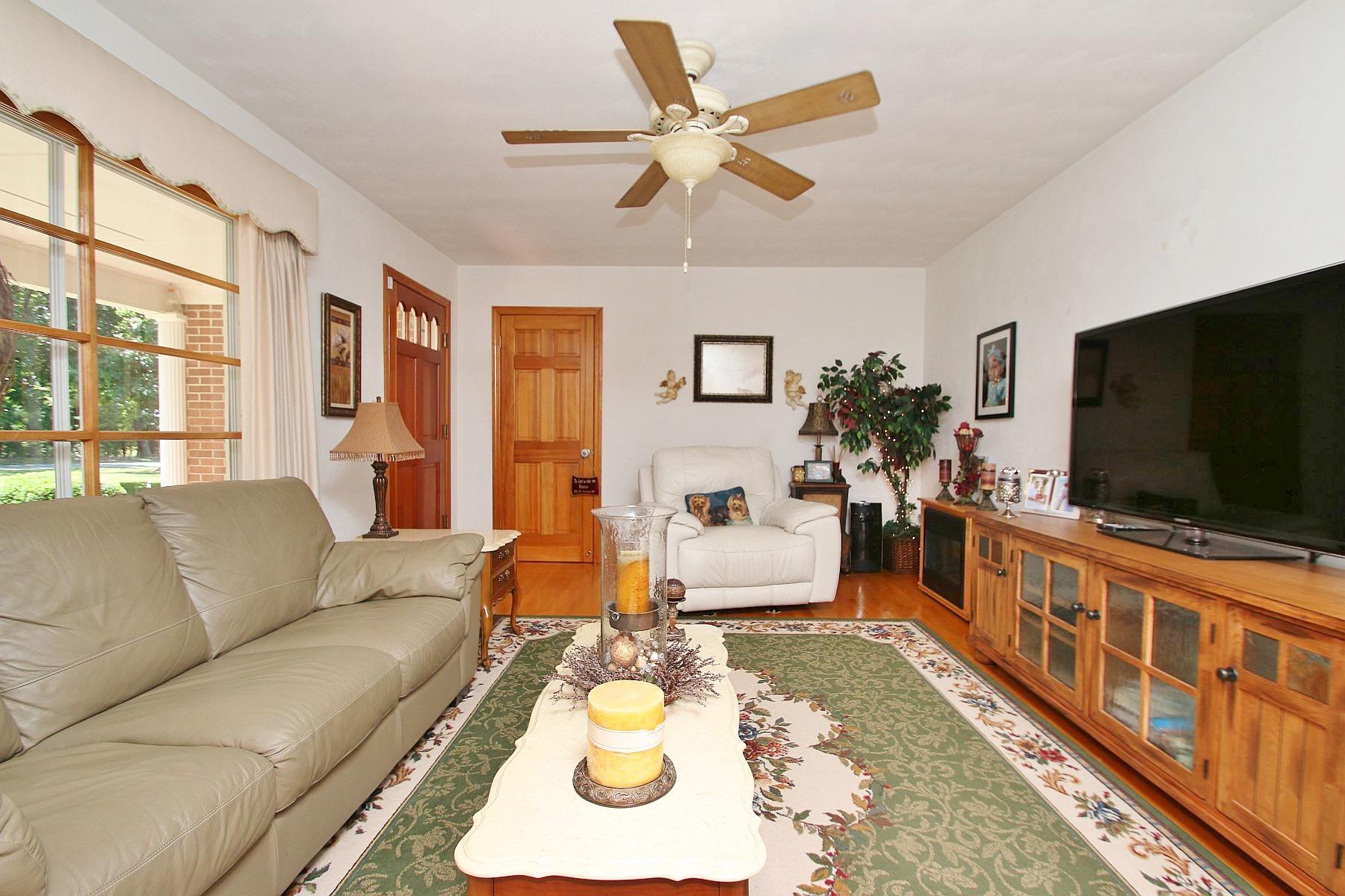 164 Standiford Road Union Hall, VA 24176 - Photo 14 of 40 a living room with furniture and a flat screen tv