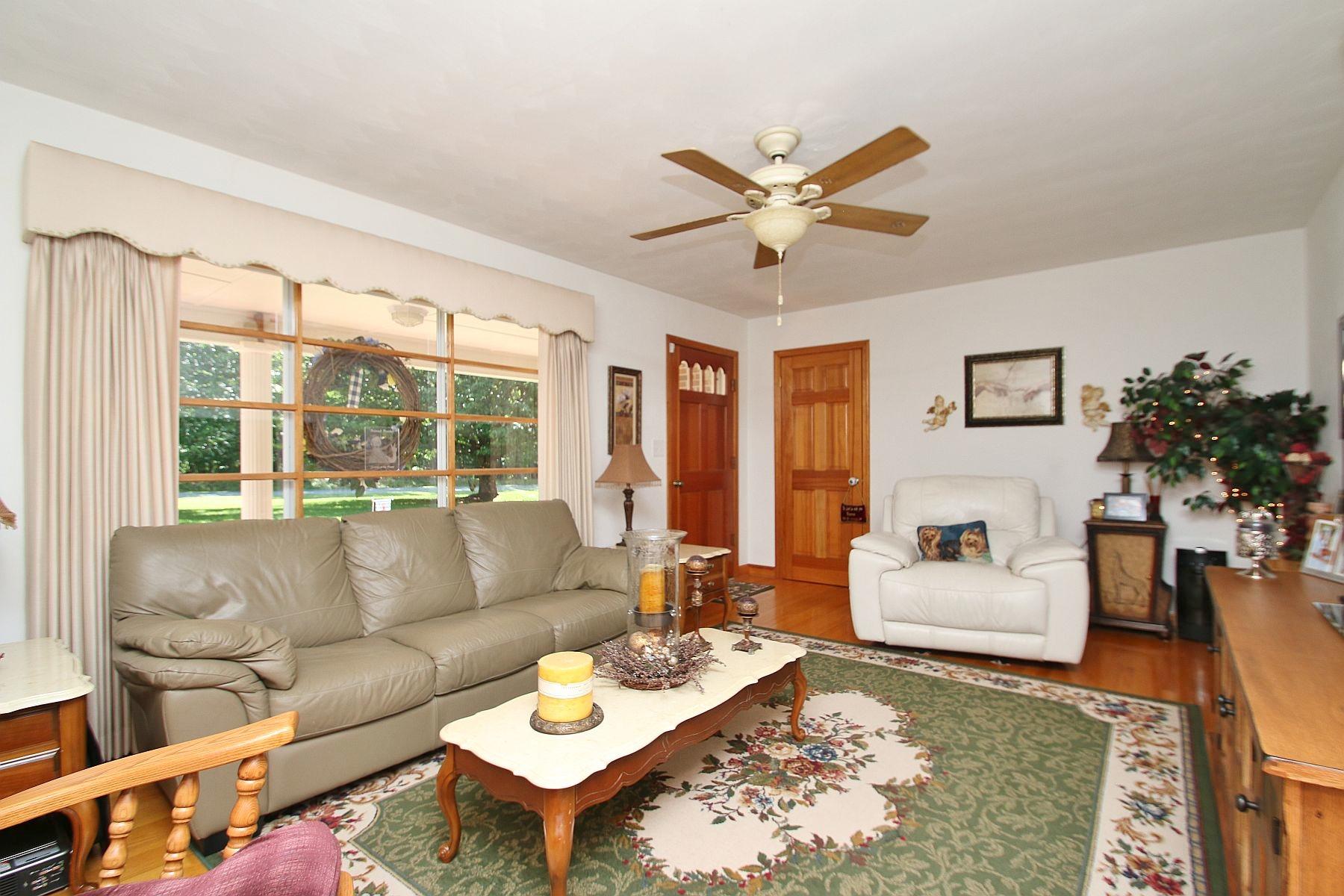 164 Standiford Road Union Hall, VA 24176 - Photo 15 of 40 a living room with furniture and a large window