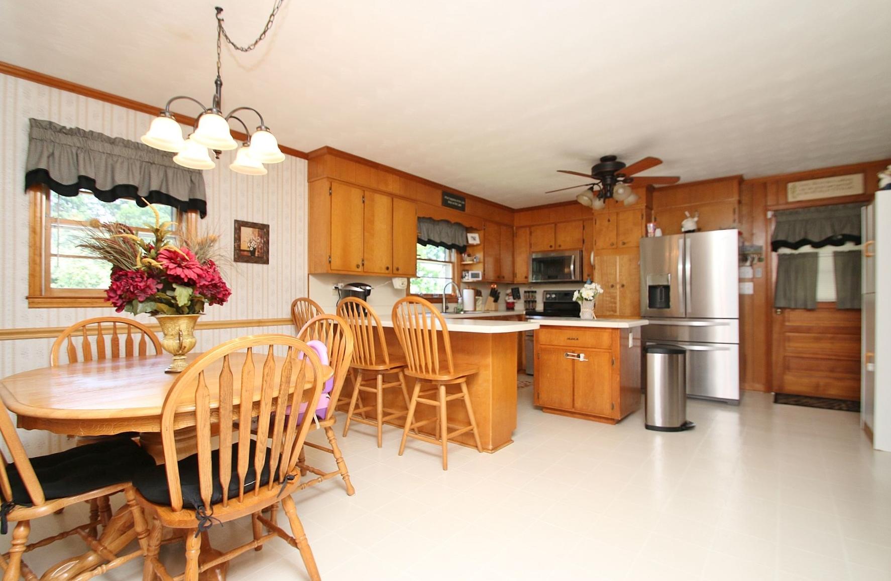 164 Standiford Road Union Hall, VA 24176 - Photo 16 of 40 a view of a dining room kitchen and a chandelier