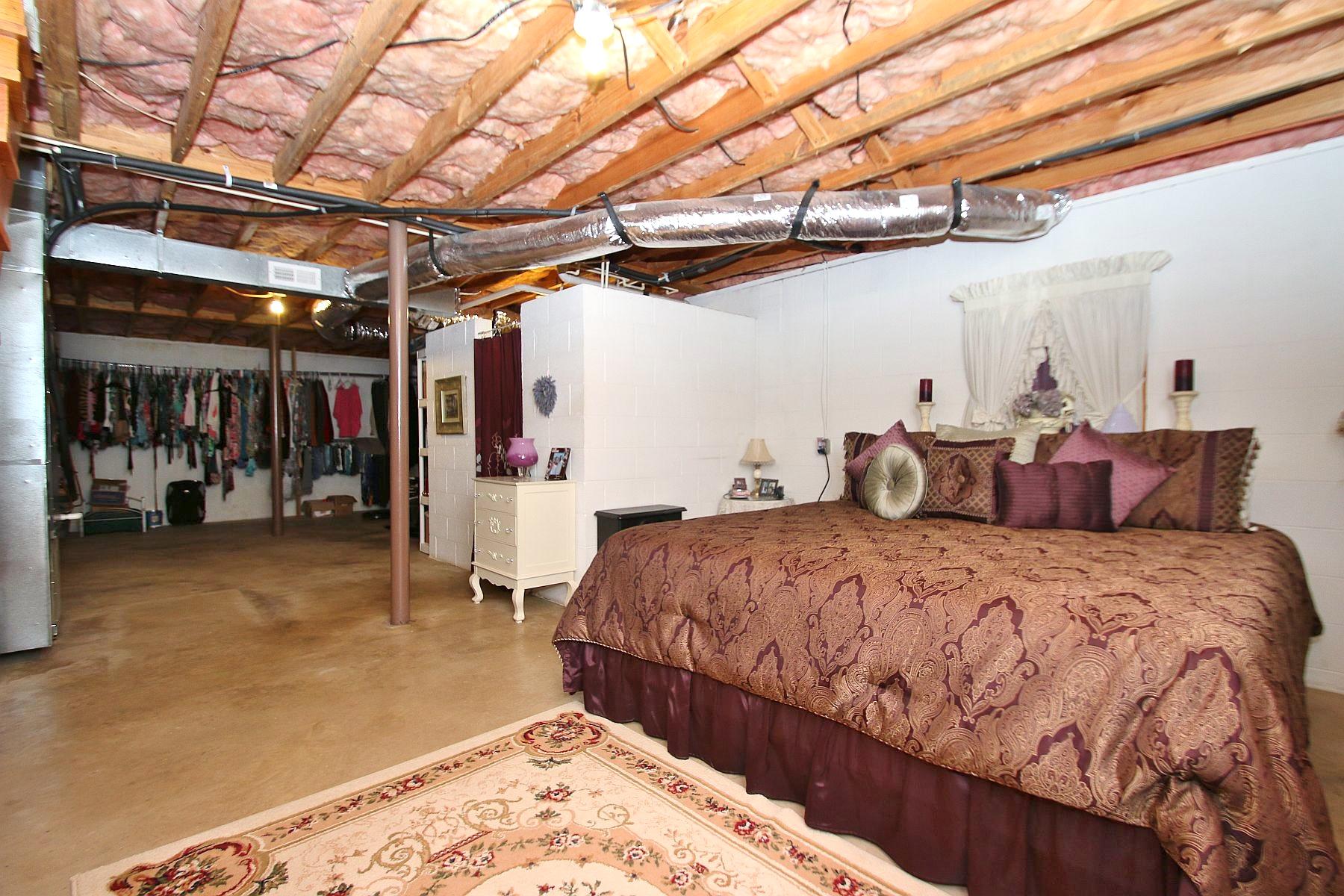 164 Standiford Road Union Hall, VA 24176 - Photo 26 of 40 a bed room with a bed and a walk in closet