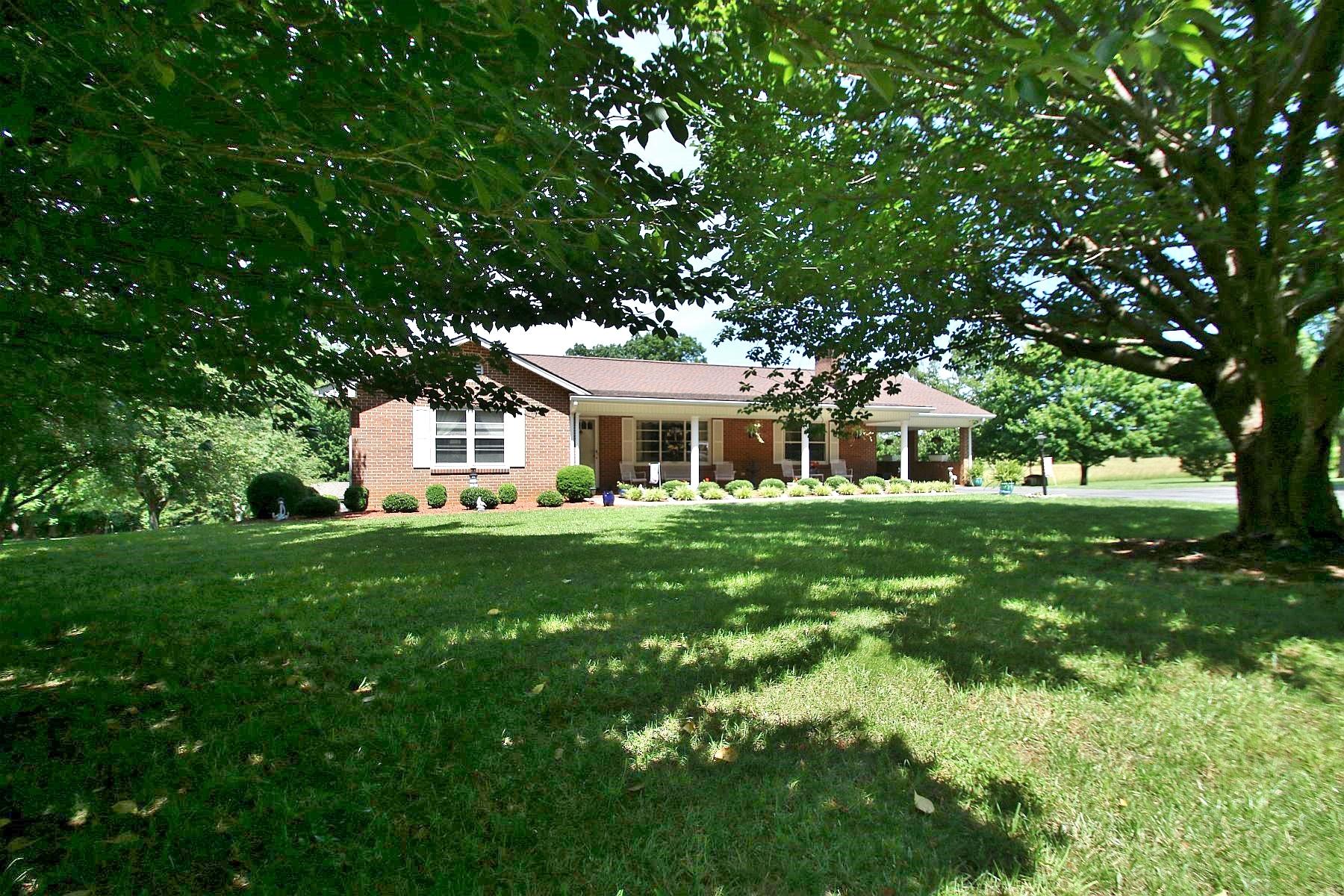 164 Standiford Road Union Hall, VA 24176 - Photo 34 of 40 a front view of a house with a garden