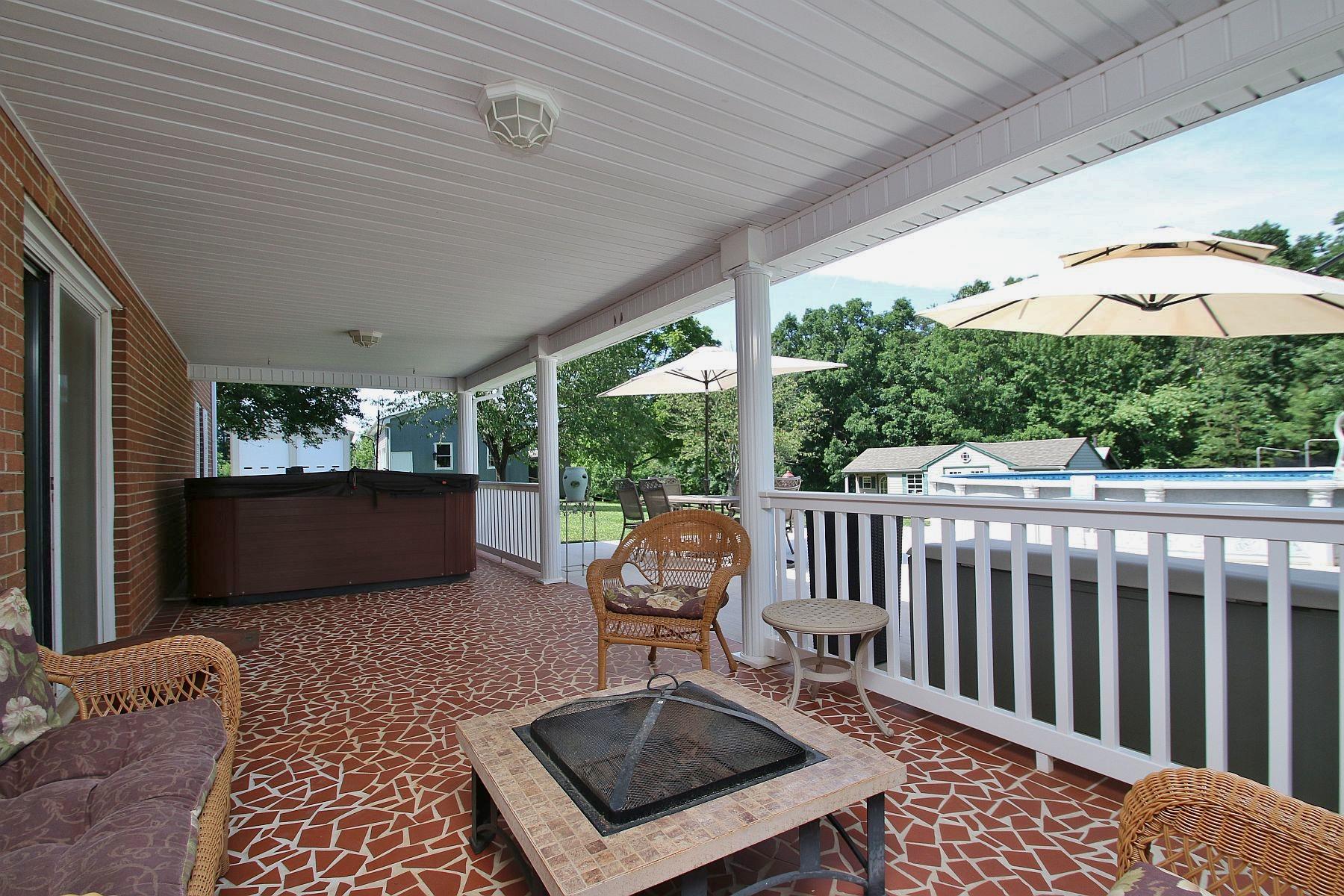 164 Standiford Road Union Hall, VA 24176 - Photo 6 of 40 a view of a chair and tables in the balcony