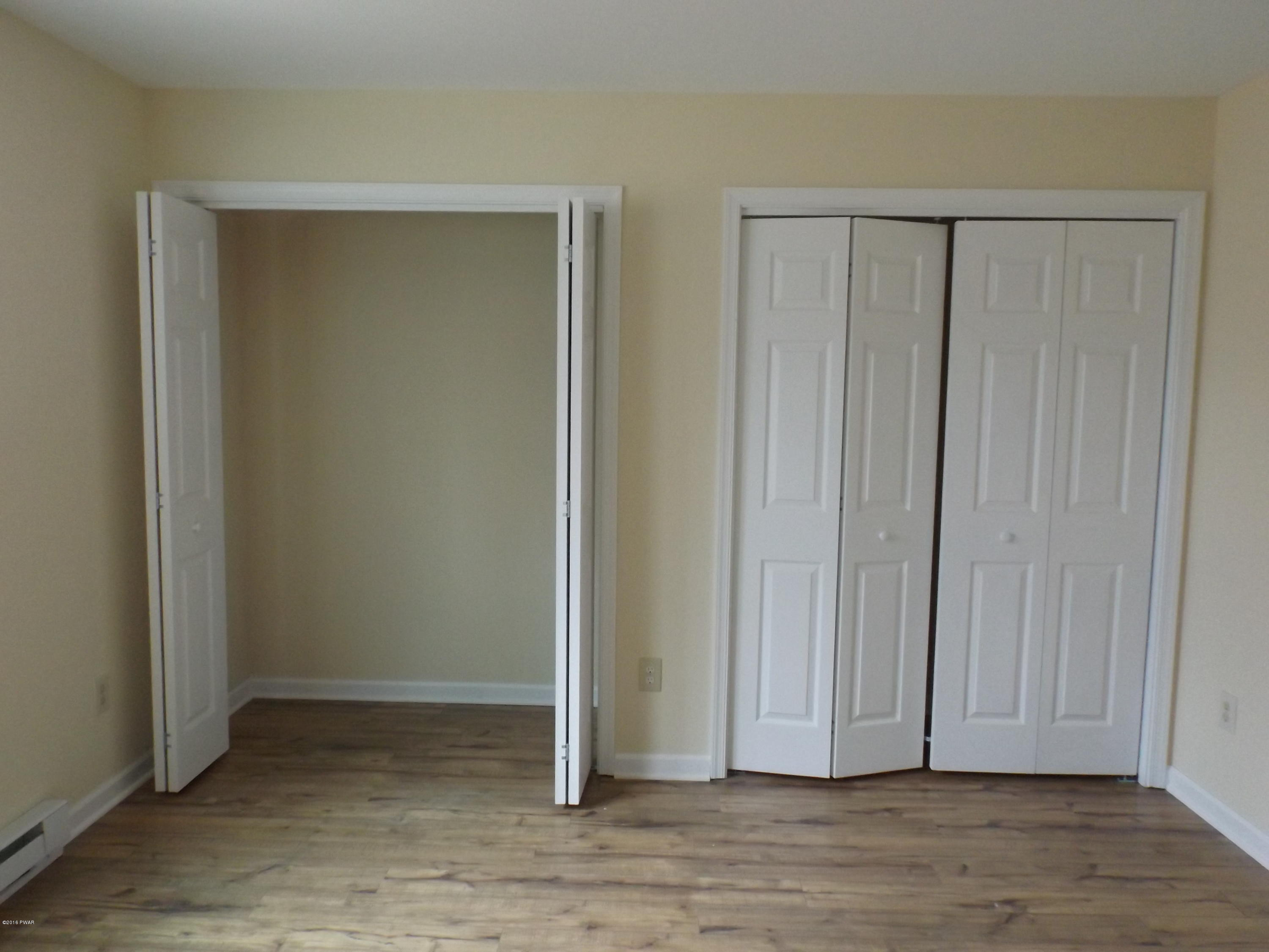 109 Keystone Court Dingmans Ferry, PA 18328 - Photo 5 of 18 a view of entryway with wooden floor