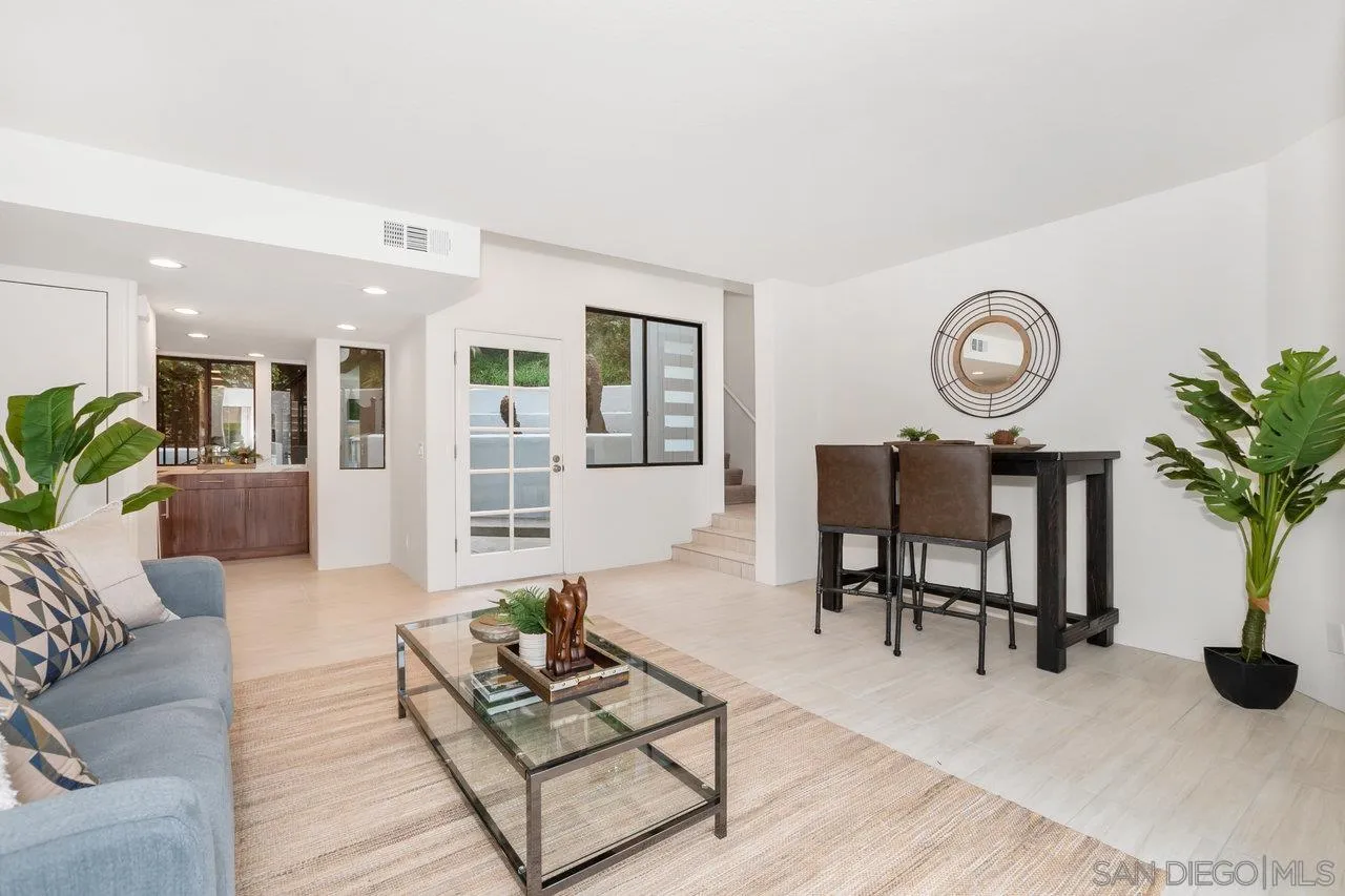 6105 Avenida Chamnez La Jolla, CA 92037 - Photo 22 of 59 a living room with furniture and wooden floor