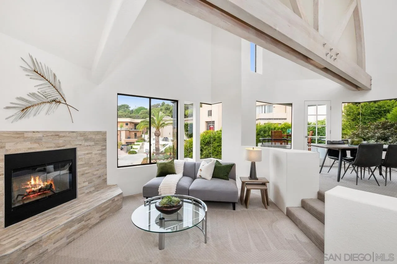 6105 Avenida Chamnez La Jolla, CA 92037 - Photo 4 of 59 a living room with furniture and a fireplace