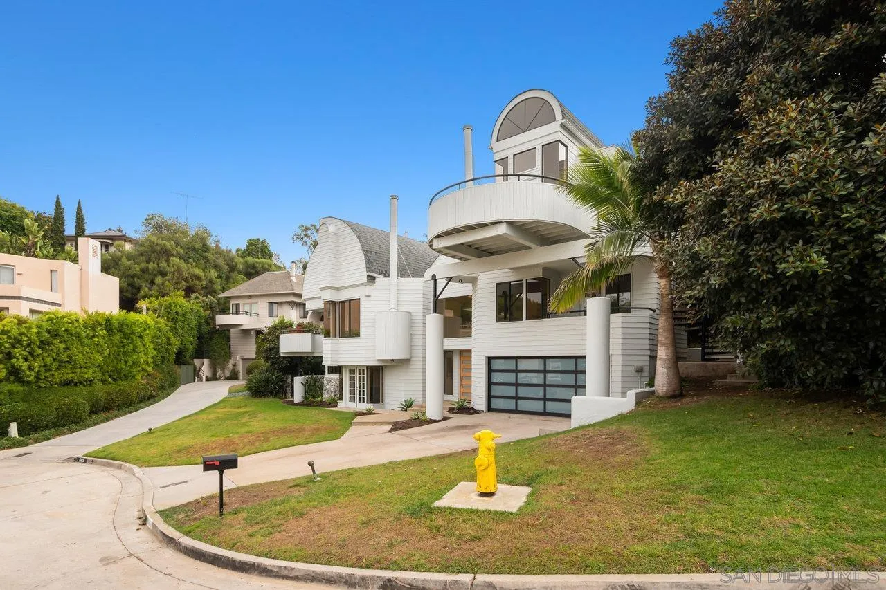 6105 Avenida Chamnez La Jolla, CA 92037 - Photo 43 of 59 a view of a house with swimming pool and porch