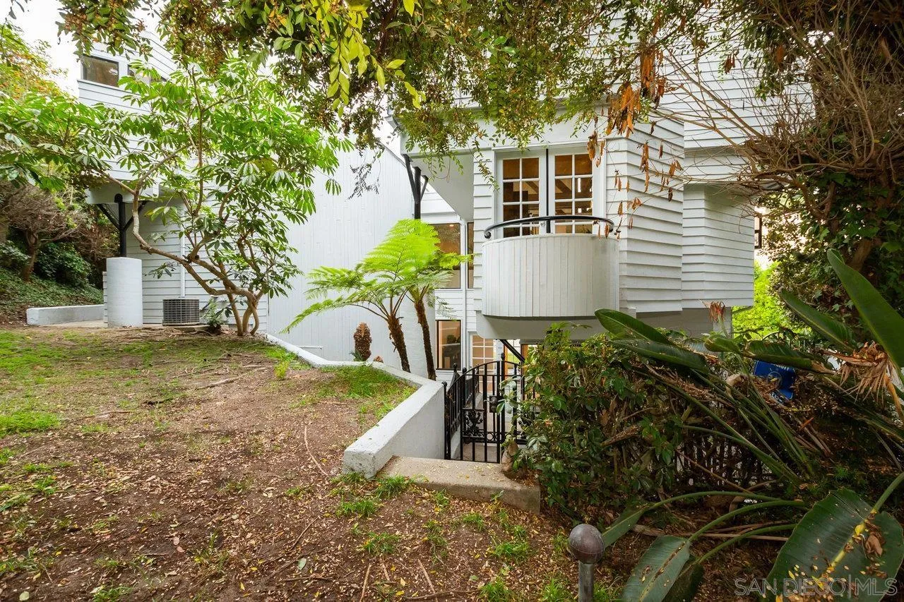 6105 Avenida Chamnez La Jolla, CA 92037 - Photo 54 of 59 a front view of a house with a yard
