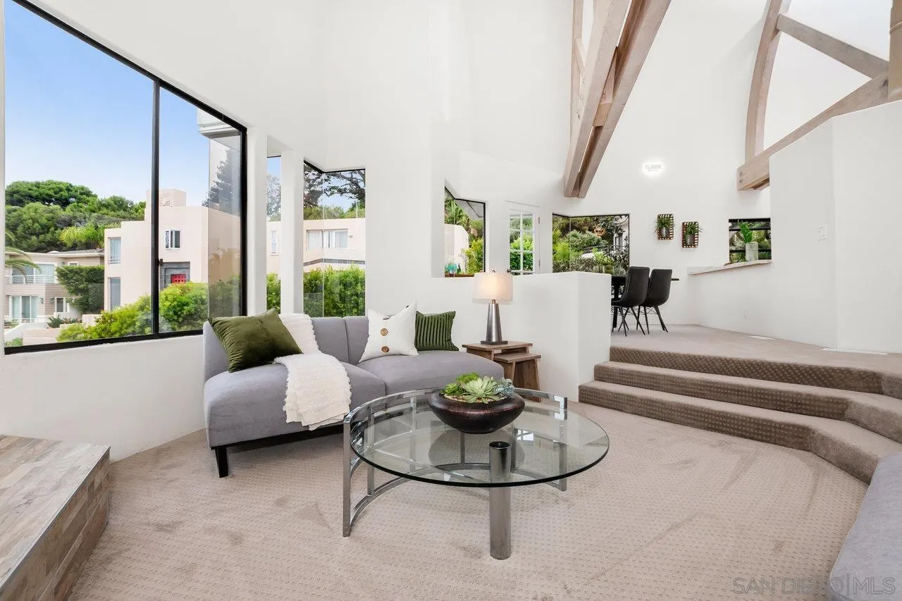 6105 Avenida Chamnez La Jolla, CA 92037 - Photo 9 of 59 a living room with furniture and a potted plant