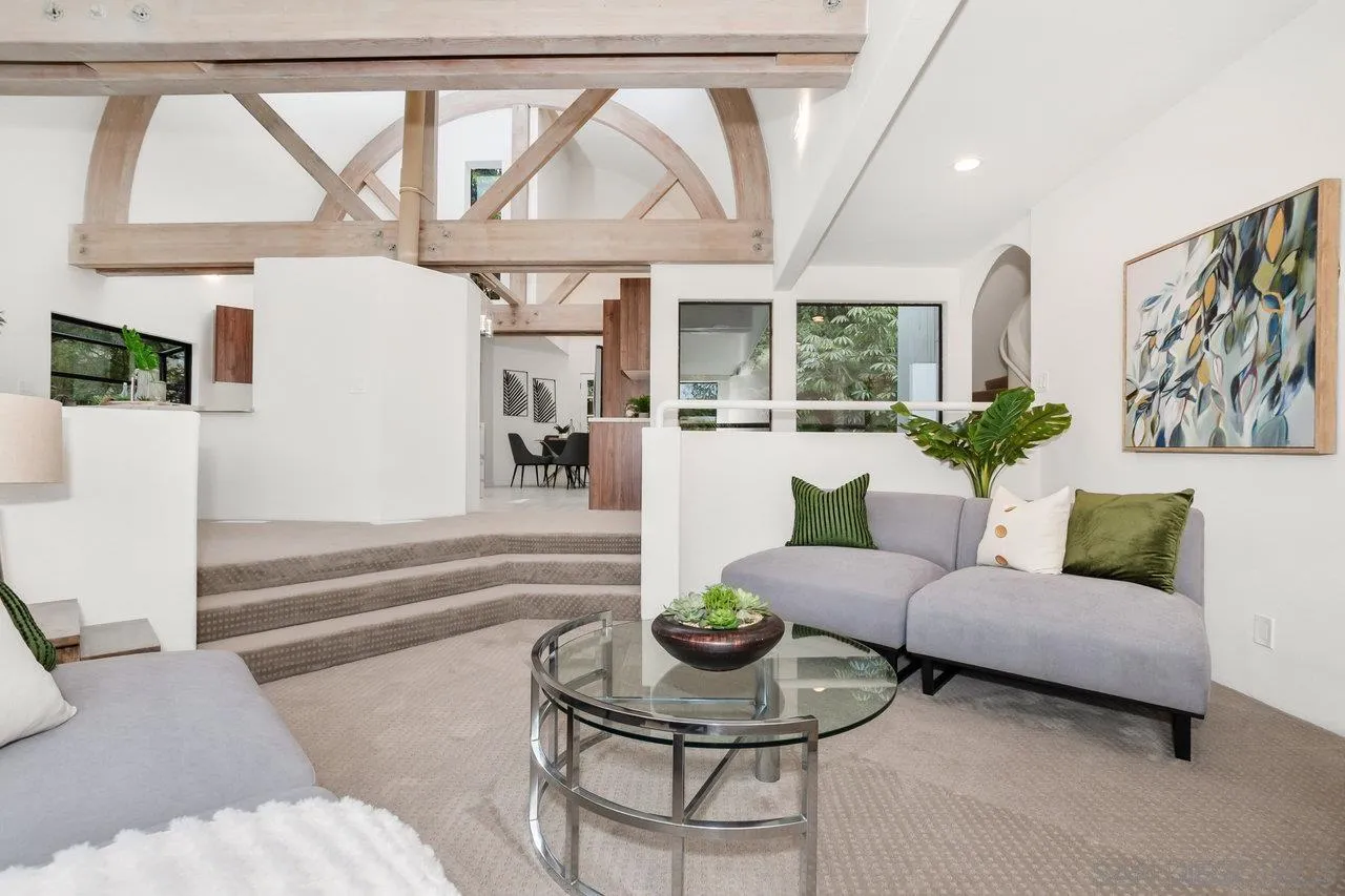 6105 Avenida Chamnez La Jolla, CA 92037 - Photo 10 of 59 a living room with furniture and a large window