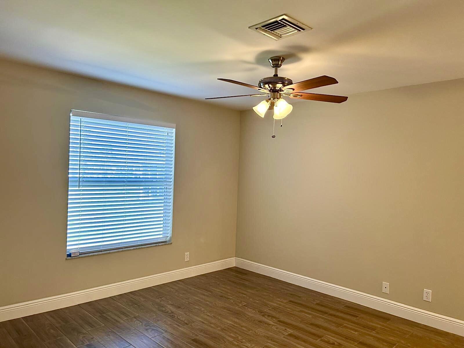 2811 Southwest 15th Street, Unit 202 Delray Beach, FL 33445 - Photo 14 of 35 Main bedroom