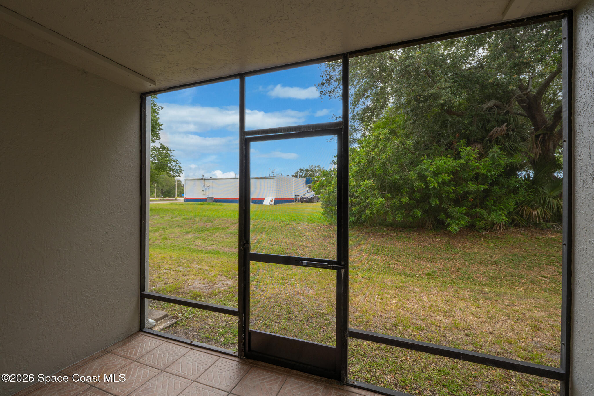 1720 Murrell Road, Unit 120 Rockledge, FL 32955 - Photo 21 of 33 View from Rear Patio