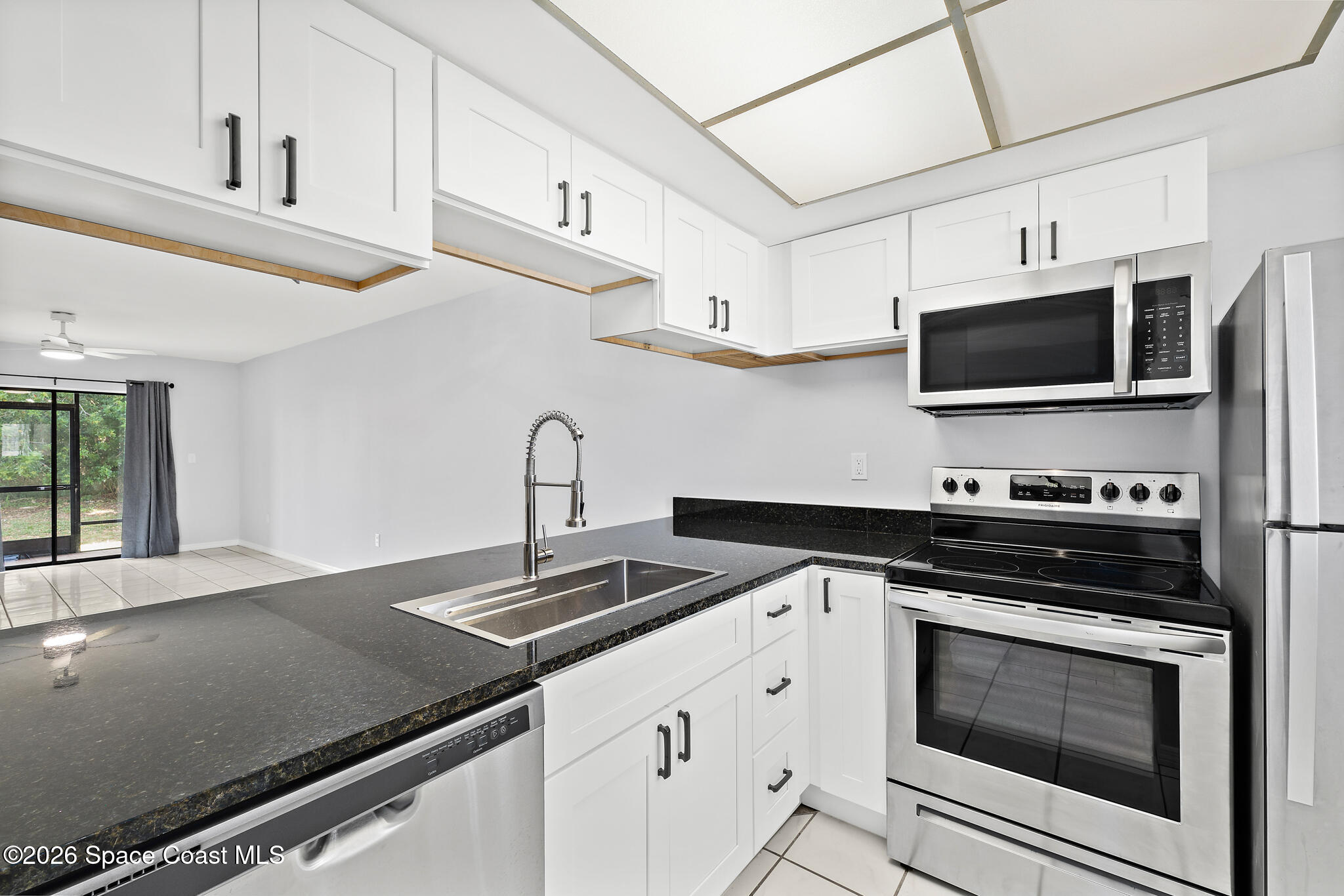1720 Murrell Road, Unit 120 Rockledge, FL 32955 - Photo 3 of 33 Bright Modern Kitchen