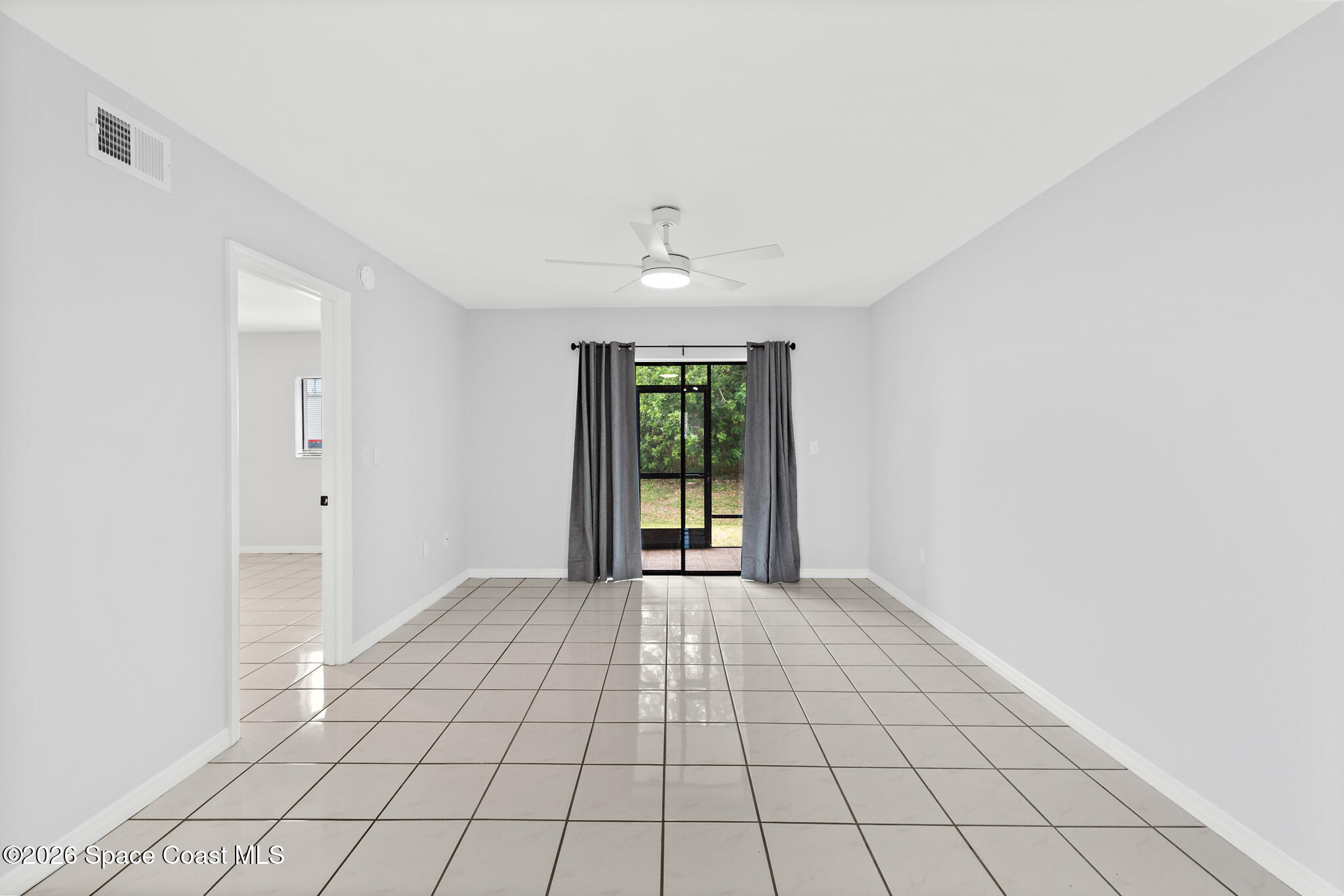 1720 Murrell Road, Unit 120 Rockledge, FL 32955 - Photo 9 of 33 Light & Bright Living Room