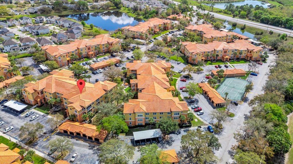 5471 Vineland Road, Unit 7301 Orlando, FL 32811 - Photo 33 of 34 an aerial view of residential houses with outdoor space