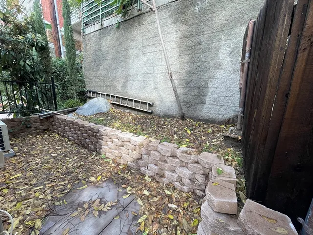 a view of a door back yard of a house
