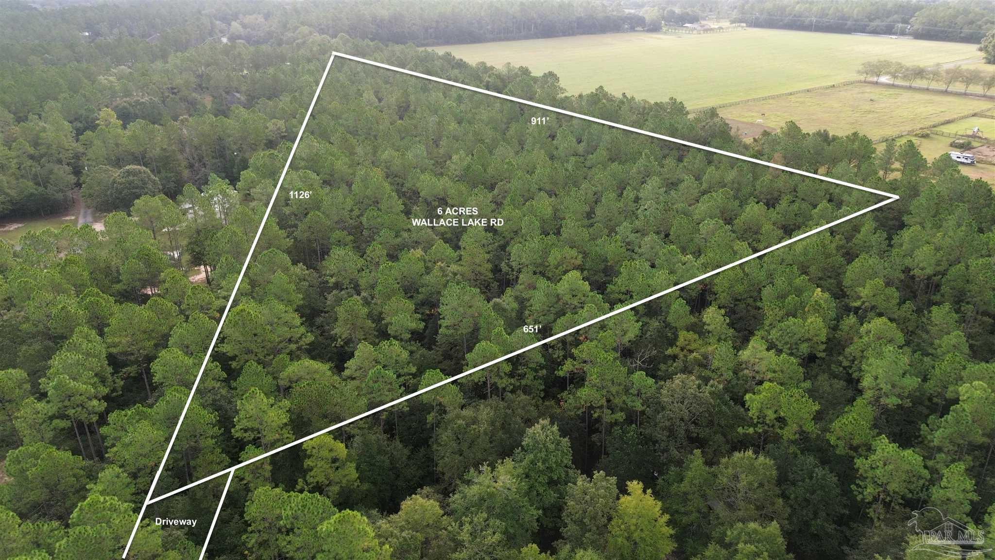 1 Wallace Lake Road Pace, FL 32571 - Photo 1 of 5 Gallery Image 1