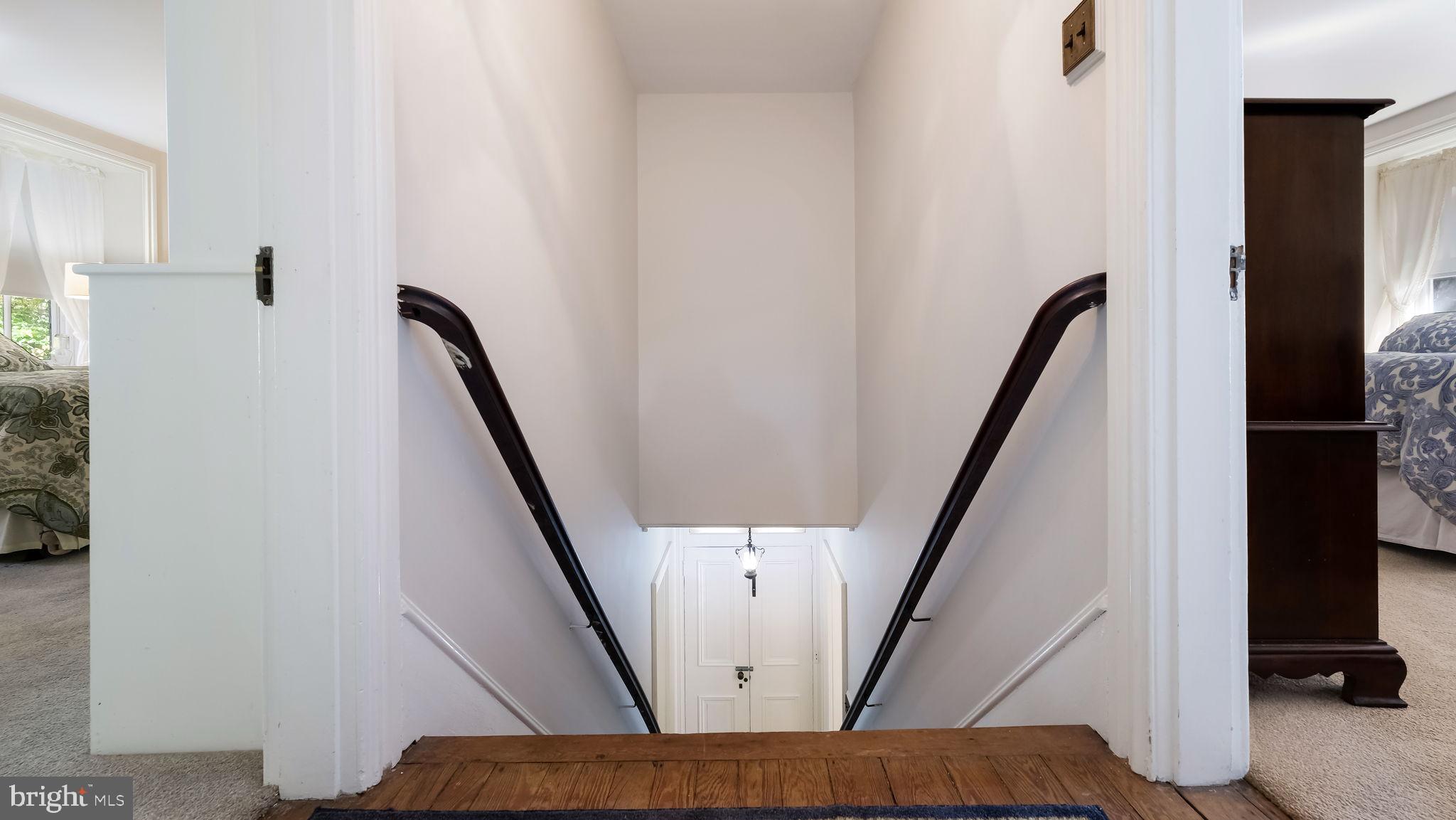 512 Moreland Road Huntingdon Valley, PA 19006 - Photo 23 of 59 STAIRCASE TO 1ST LEVEL UPSTAIRS