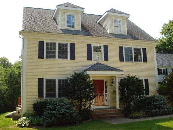 344 Weston Road Wellesley, MA 02482 - Photo 1 of 10 a front view of a house with garden