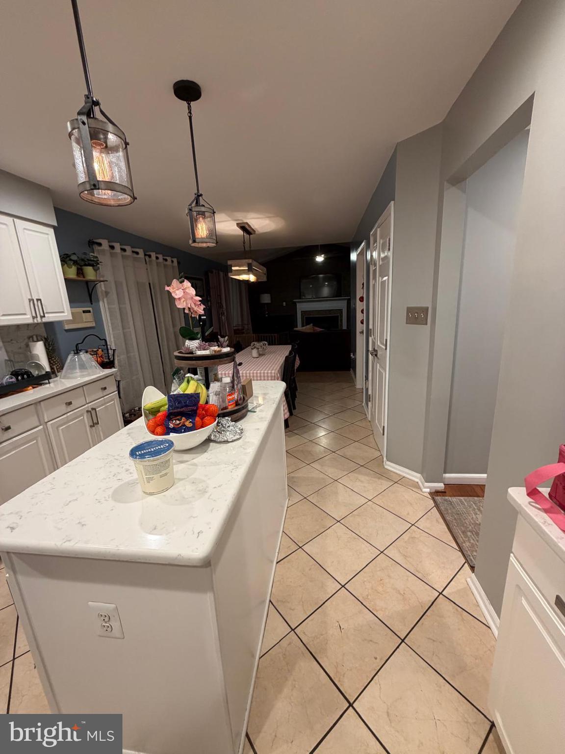 9300 Nancy Street Manassas Park, VA 20111 - Photo 19 of 22 a dining hall with a sink and chandelier