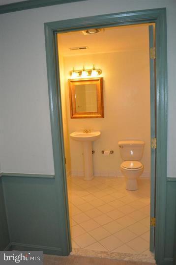 9300 Nancy Street Manassas Park, VA 20111 - Photo 3 of 22 a bathroom with a sink