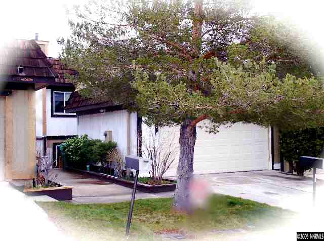 3949 Kings Row Reno, NV 89503 - Photo 1 of 9 a front view of a house with garden