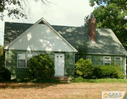 29 Station Road Cranbury, NJ 08512 - Photo 1 of 1 a backyard of a house with lots of green space