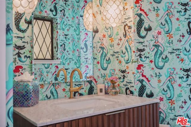 a bathroom with a sink and a toilet