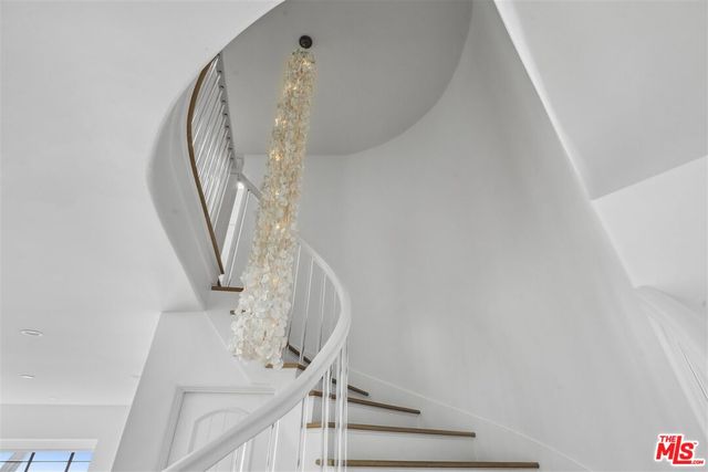 a bedroom with a bed and a fireplace