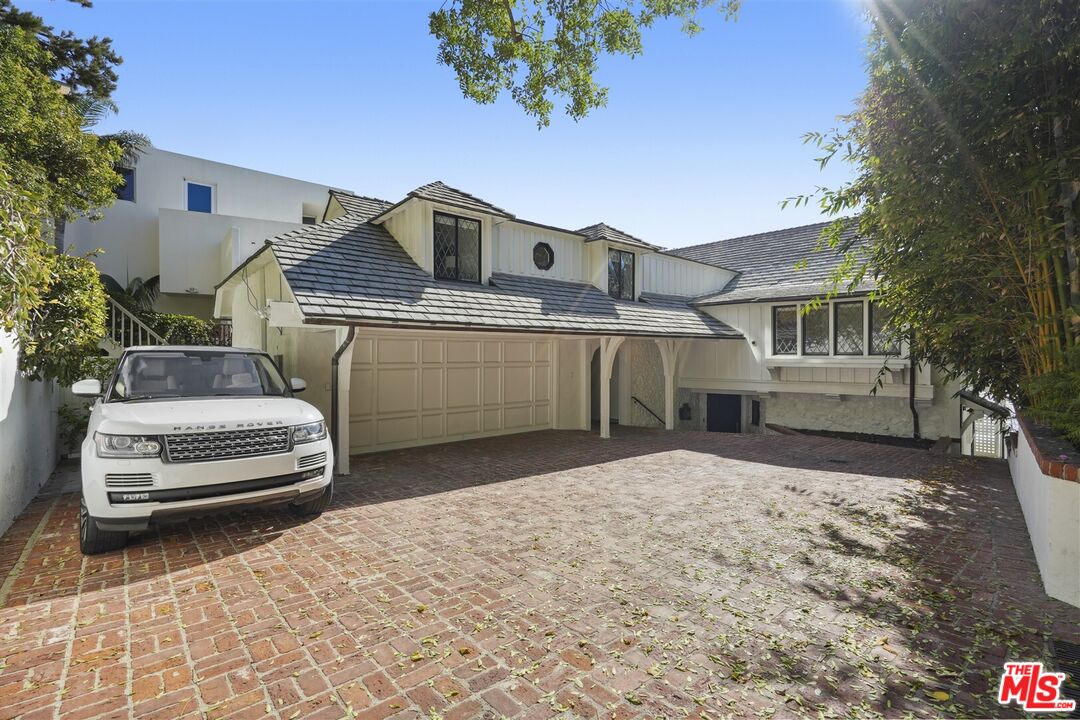 31500 Victoria Point Road Malibu, CA 90265 - Photo 49 of 53 a front view of a house with a yard
