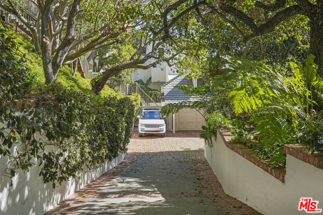 31500 Victoria Point Road Malibu, CA 90265 - Photo 52 of 53 a view of a pathway with a tree