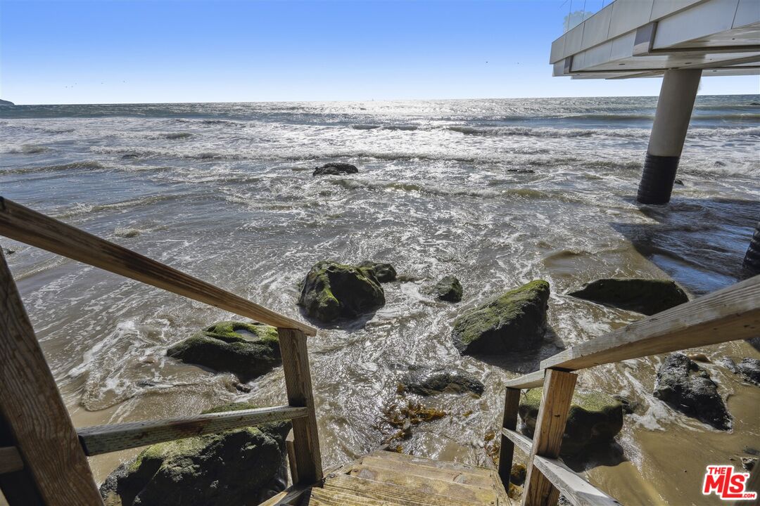31500 Victoria Point Road Malibu, CA 90265 - Photo 53 of 53 a view of an ocean from a balcony